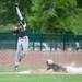 Big Reds Conner Berge safely slides in to third base during the third inning of their regional tournament game against Riverview, Saturday June 8.
Courtney Sacco I AnnArbor.com 