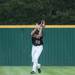 Big Reds Devin Miller catches the ball for an out during the fourth inning of their regional tournament game against Riverview, Saturday June 8.
Courtney Sacco I AnnArbor.com 
