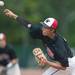 Big Reds Kyle Schrader pitches the ball during the first inning of their regional tournament game against Riverview, Saturday June 8.
Courtney Sacco I AnnArbor.com 