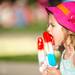 Three-year-old Maya Adar of Ann Arbor enjoys a Bomb Pop popsicle at Top of the Park, Friday, June 15.
Courtney Sacco I AnnArbor.com 