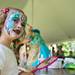 Seven-year-old Abby Plavnick shows her parents her face after having it panted by Body Masterpiece at the debut night of Top of the Park 2013 on Friday, June 15.
Courtney Sacco I AnnArbor.com 