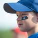 A player looks out onto the field during youth baseball's opening day at Veteran's Memorial Park.
Courtney Sacco I AnnArbor.com