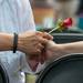 Two women hold hands during a gay community rally in Ann Arbor's Kerrytown as the community celebrates the U.S. Supreme Court's rulings made on same-sex marriage earlier in the day, Wednesday, June 26.
Courtney Sacco I AnnArbor.com    