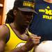 Former Michigan quarterback Denard Robinson, now a member of the Jacksonville Jaguars sings an autograph at the M Den on Wednesday, July, 10. 
Courtney Sacco I AnnArbor.com    
