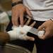A fighter has his hands taped up before his fight at A2 Fest at the Washtenaw Farm Council Grounds, Friday, July 12.
Courtney Sacco I AnnArbor.com 