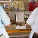 Volunteers box up chicken dinners for takeout during the 60th Manchester Chicken Broil.  
Courtney Sacco I AnnArbor.com 