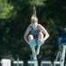 Miranda E.  jumps off the board during the 15 and over diving portion of the WISC championships, at the Huron Valley Swim Club in Ann Arbor, Wednesday, July 24.
Courtney Sacco I AnnArbor.com     