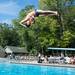 A 15-and-under diver jumps off the board during the third  day of the WISC championships at the Huron Valley Swim Club in Ann Arbor, Wednesday, July 24.
Courtney Sacco I AnnArbor.com     