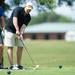 Michigan alumni Jack Johnson sets up a practice swing before teeing off  during the Michigan hockey alumni golf outing, Saturday August, 3.Courtney Sacco I AnnArbor.com 