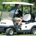 A Michigan hockey alumni drives a golf cart reverse during the Michigan hockey alumni golf outing at the University of Michigan Golf Course in Ann Arbor, Saturday August, 3.Courtney Sacco I AnnArbor.com 