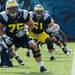 Michigan offensive linemen Graham Glasgow during a drill on the practice field outside of the Al Glick Field House on Thursday, August 8, 2013. 
Courtney Sacco I AnnArbor.com 