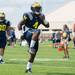 Michigan running back De'Veon Smith during a drill on the practice field outside of the Al Glick Field House on Thursday, August 8, 2013. 
Courtney Sacco I AnnArbor.com 