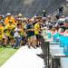 Kids race to the tables of freshmen players at he start of youth day at Michigan Stadium, Sunday, August, 11.
Courtney Sacco I AnnArbor.com 