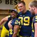 Michigan's defensive back Delonte Hollowell and defensive end Matthew Godin goof around in the locker room during media day, Sunday, August, 11.Courtney Sacco AnnArbor.com 