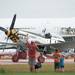 A P-51 pilot waves after landing during the 2013 Thunder Over Michigan air show at the Willow Run airport, Saturday, August, 10.
Courtney Sacco I AnnArbor.com 