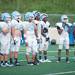 Skyline varsity High School football team players  watch as team mates run drills during practice, Thursday, August, 15.
Courtney Sacco I AnnArbor.com 