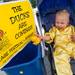 One year old Ra Shankwiler Rataezyk places his rubber duck the bucket before the Ypsilanti Heritage Festival duck race, Sunday, August 18.
Courtney Sacco I AnnArbor.com   