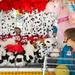 A girl peeks through rows of prizes at the Chelsea Community Fair in Chelsea, Friday, August, 23.Courtney Sacco I AnnArbor.com