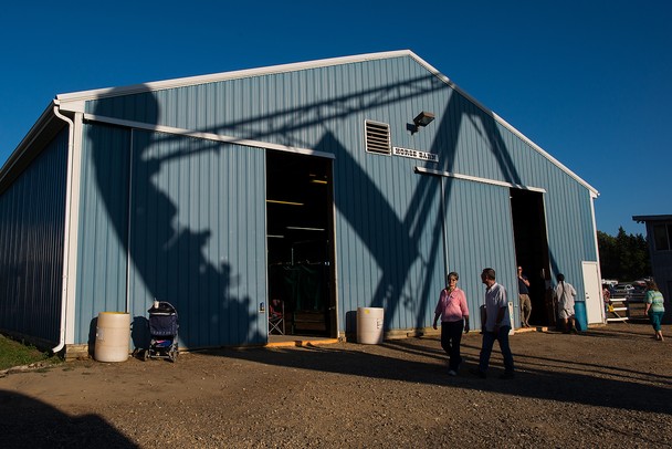 A carnival ride shadow falls on the horse barn at the Chelsea Community Fair, Friday, August, 23.Courtney Sacco I AnnArbor.com  