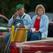 Paul Bollinger and Chris Rentshler sit in a pickup bed eating ice-cream as they watch the tractor pull at the Chelsea Community Fair in Chelsea, Friday, August, 23.Courtney Sacco I AnnArbor.com  
