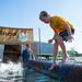 Elijah Ratliff tries to walk on a log during the lumber jack show at the Chelsea Community Fair, Friday, August, 23.
Courtney Sacco I AnnArbor.com  
