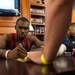 Former Wolverines basketball player Tim Hardaway Jr signs an autograph at the MDen in Ann Arbor, Saturday, August, 24.
Courtney Sacco I AnnArbor.com 