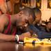 Former Wolverines basketball player Tim Hardaway Jr signs an autograph at the MDen in Ann Arbor, Saturday, August, 24.
Courtney Sacco I AnnArbor.com   