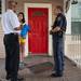 Executive director of UM's Division of Public Safety and Security Eddie L. Washington Jr., Ann Arbor chief of police John Seto, and UM senior Stephanie Karaa wait outside a home on Hill street as they go house to house talking to students living off campus during an outreach program run by Beyond the Diag, Thursday, Aug, 29.
Courtney Sacco I AnnArbor.com 