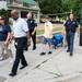 Executive director of UM's Division of Public Safety and Security Eddie L. Washington Jr., Ann Arbor chief of police John Seto, UM Police Chief Joe Piersante and UM grad student Matt Lonnerstater walk down State street during a outreach program run by Beyond the Diag, Thursday, Aug, 29.
Courtney Sacco I AnnArbor.com  