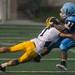 Hartland's Anthony Colaianne tackles the Eagles running back Nate Spencer during the first quarter of their game at Skyline High School, Thursday, Aug. 29.
Courtney Sacco I AnnArbor.com  
