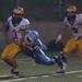 Eagles Terry Jackson tackles Hartland's Anthony Colaianne during the second quarter of their game, Thursday, Aug. 29.
Courtney Sacco I AnnArbor.com  