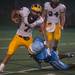 Eagles Terry Jackson tackles Hartland's running back Austin Pierce during the second quarter of their game, Thursday, Aug. 29.
Courtney Sacco I AnnArbor.com  