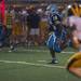 Eagles Terry Jackson runs the ball during the second quarter of their game against Hartland, Thursday, Aug. 29.
Courtney Sacco I AnnArbor.com  