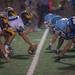 Hartland hicks the ball in the rain during the second quarter of their game against Skyline, Thursday, Aug. 29.
Courtney Sacco I AnnArbor.com  