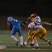 Hartland's Andy Maschke and Jacob Economcl tackle Skyline quarterback Askaree Crawford during the third quarter of their game, Thursday, Aug. 29.
Courtney Sacco I AnnArbor.com  