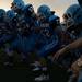 The Eagles huddle taking the field for their first game of the season, Thursday, Aug. 29.
Courtney Sacco I AnnArbor.com  