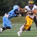 The Eagles Kornelius Saxton tackles Hartland's running back Austin Pierce during the first quarter of their game at Skyline High School, Thursday, Aug. 29.
Courtney Sacco I AnnArbor.com  