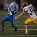 The Eagles running back Terry Jackson runs the ball past Hartland's Bon Quella for a first down during the fourth quarter of their game at Skyline High School, Thursday, Aug. 29.
Courtney Sacco I AnnArbor.com  
