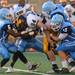 The Eagles tackle Hartland's quarterback Trevor Sudbay during the first quarter of their game at Skyline High School, Thursday, Aug. 29.
Courtney Sacco I AnnArbor.com  