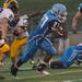 The Eagles running back Nate Spencer runs the ball for a first down during the first quarter of their game against Hartland at Skyline High School, Thursday, Aug. 29.
Courtney Sacco I AnnArbor.com  