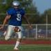 The Railsplitters kicker C.J. Butler punts the ball during the first quarter of their game against Belleville at Lincoln High School, Friday, Aug, 30.
Courtney Sacco I AnnArbor.com    
