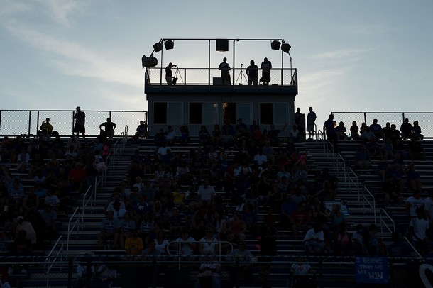 Fans pack in to the football stadium at Lincoln High School for the season opener against Belleville, Friday, Aug, 30.
Courtney Sacco I AnnArbor.com  