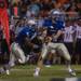 The Railsplitters quarterback Eugene Smith fakes a hand off to Daalauren Roberson during the third quarter of their game against Belleville at Lincoln High School, Friday, Aug, 30.
Courtney Sacco I AnnArbor.com    