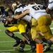 Michigan quarterback Devin Gardner is tackled for a loss of yards during the fourth quarter of their game against Notre Dame at Michigan Stadium, Saturday, Sept. 7. 
Courtney Sacco I AnnArbor.com 