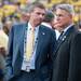 Mark Harmon talks with David Brandon the athletic director of Michigan University before the start of the Michigan  Notre Dame at Michigan Stadium, Saturday, Sept. 7. 
Courtney Sacco I AnnArbor.com 