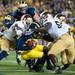 Michigan quarterback Devin Gardner is tacked by the Notre Dame defense during the second quarter of their game at Michigan Stadium, Saturday, Sept. 7. 
Courtney Sacco I AnnArbor.com 