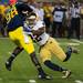 Michigan quarterback Devin Gardner is tackled by Notre Dame safety Elijah Shumte  during the third quarter of their game against Notre Dame at Michigan Stadium, Saturday, Sept. 7. 
Courtney Sacco I AnnArbor.com 