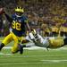 Michigan quarterback Devin Gardner dodges a tackle during the fourth quarter of their game against Notre Dame at Michigan Stadium, Saturday, Sept. 7. 
Courtney Sacco I AnnArbor.com 