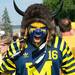 Terrance of ann arbor crosses the intersection of East Stadium blvd and South Main street before the Michigan Wolverines plays Notre Dame at Michigan Stadium, Saturday, Sept. 7. 
Courtney Sacco I AnnArbor.com 