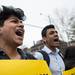 Protesters demanding tuition equality for unauthorized immigrants chant as they stand in the intersection of South State Street and South University Avenue in Ann Arbor. 
Courtney Sacco I AnnArbor.com